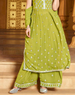 Collection of Light Green Floral Embellished work with Nyra Cut Georgette Kurti Set in a gallery layout