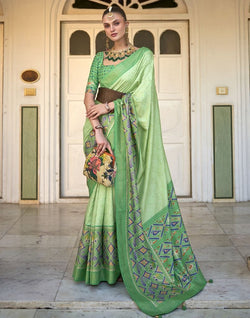 Collection of Parrot Green Bandhini Print Patola Saree in a gallery layout