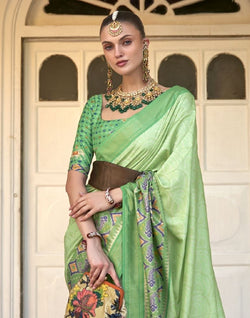 Collection of Parrot Green Bandhini Print Patola Saree in a gallery layout