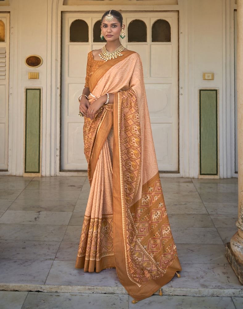 Collection of Light Orange Bandhini Print Patola Saree in a gallery layout