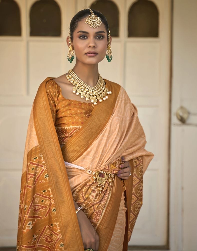 Collection of Light Orange Bandhini Print Patola Saree in a gallery layout