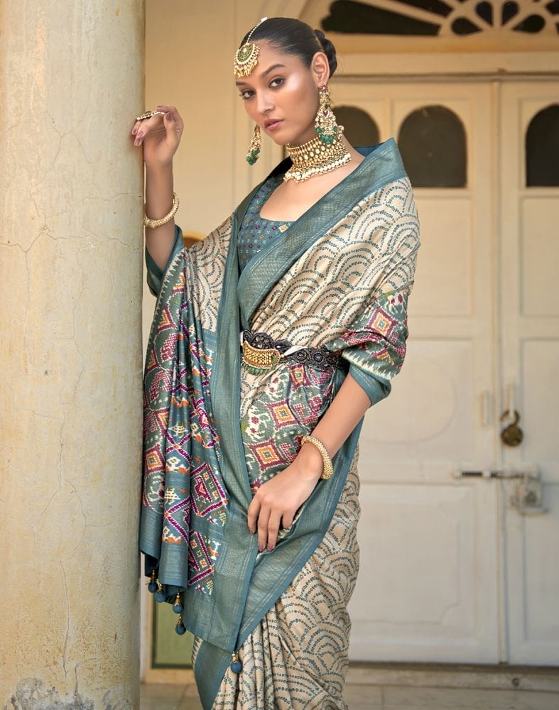 Collection of Bandhini Print Beige Coloured Patola Saree in a gallery layout