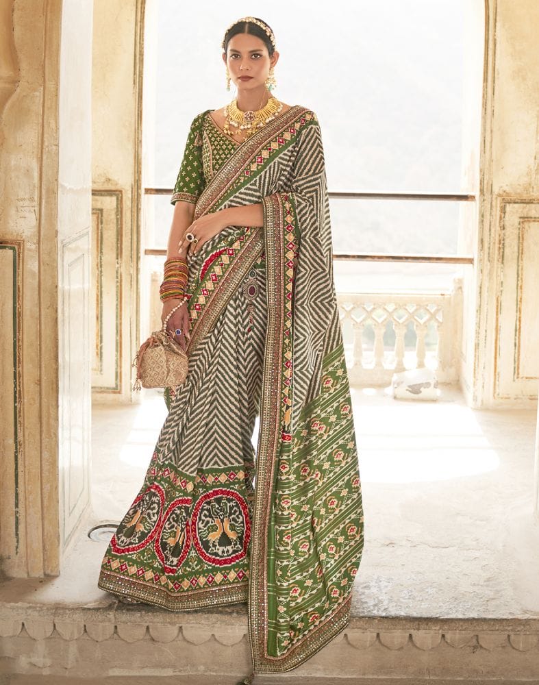 Collection of Dark Green Zig Zag Dola Silk Fabric Saree in a gallery layout