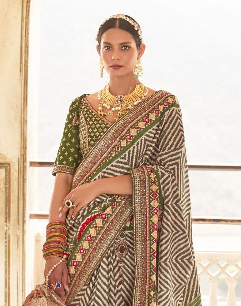 Collection of Dark Green Zig Zag Dola Silk Fabric Saree in a gallery layout