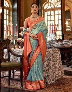 Collection of Emerald Sky Blue Floral Weaving Soft Silk Saree in a gallery layout