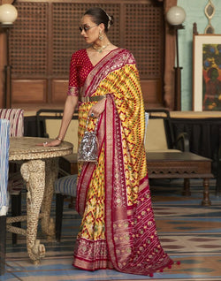 Collection of Magnificent Mustard Ikat Patola Printed Saree in a gallery layout