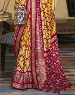 Collection of Magnificent Mustard Ikat Patola Printed Saree in a gallery layout