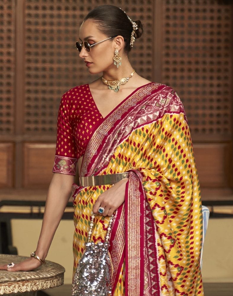 Collection of Magnificent Mustard Ikat Patola Printed Saree in a gallery layout