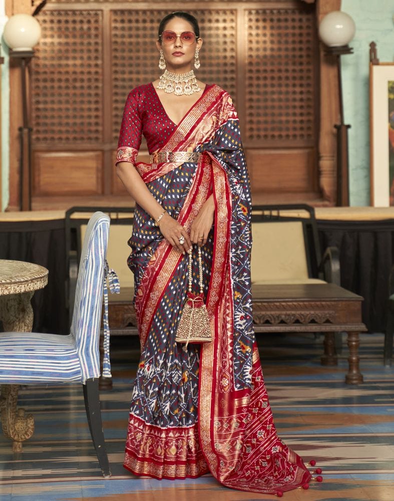 Collection of Navy Blue Ikat Smooth Patola Saree in a gallery layout