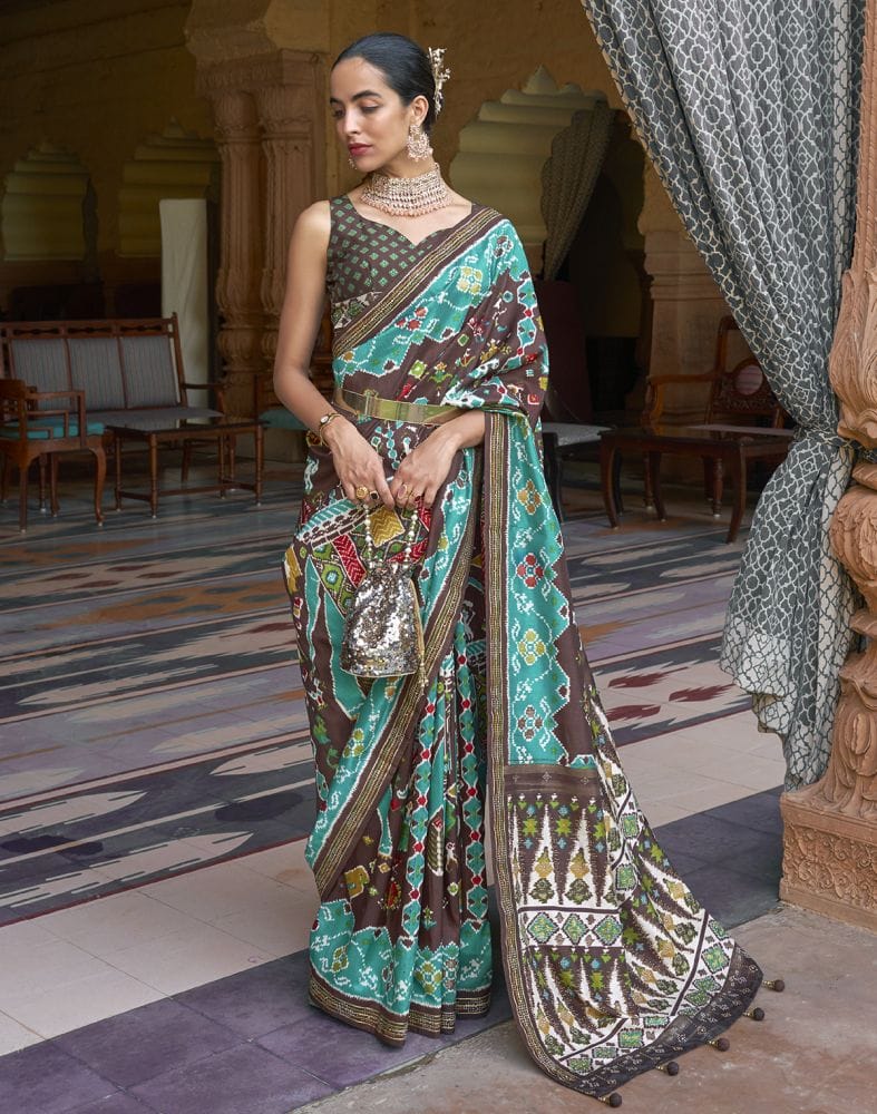 Collection of Stylish Brown Ikat Print Patola Saree in a gallery layout