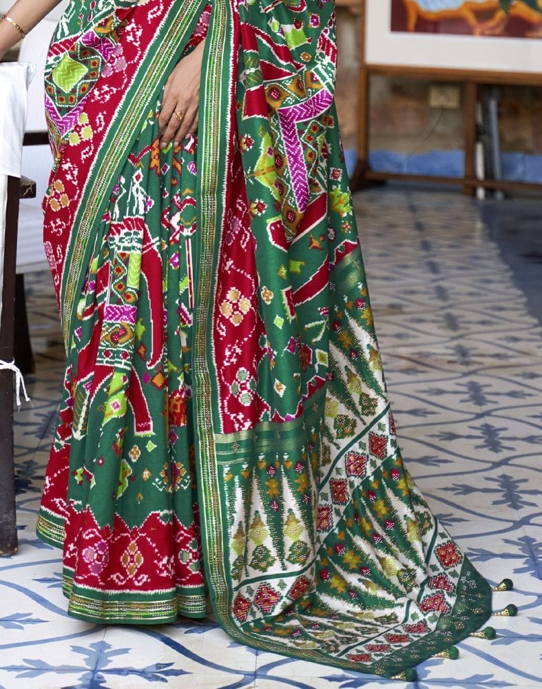 Collection of Stunning Green Coloured Ikat Patola Silk Saree in a gallery layout