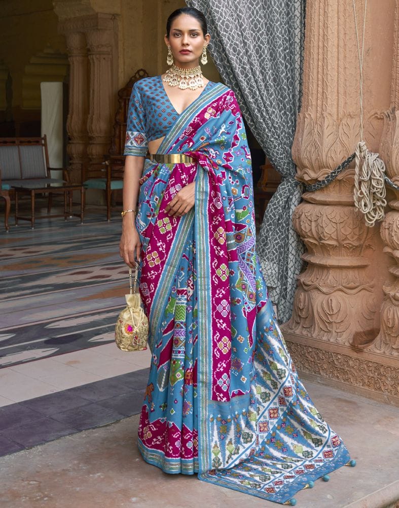 Collection of Sky Blue Ikat Soft Patola Silk Saree in a gallery layout