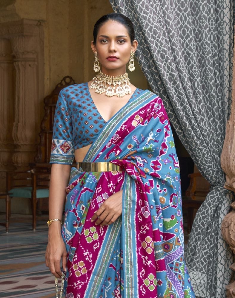 Collection of Sky Blue Ikat Soft Patola Silk Saree in a gallery layout