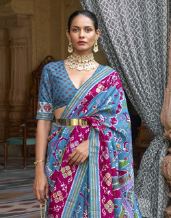 Collection of Sky Blue Ikat Soft Patola Silk Saree in a gallery layout