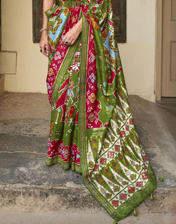 Collection of Stupendous Green Ikat Patola Saree in a gallery layout