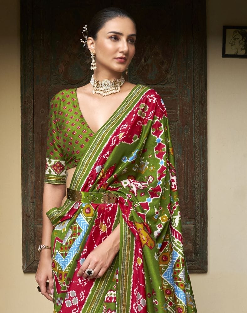 Collection of Stupendous Green Ikat Patola Saree in a gallery layout