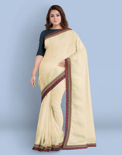 Collection of Cream Plain Satin Saree in a gallery layout