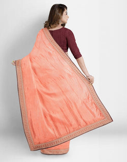 Collection of Peach Self Design Plain Shimmer Fabric Saree in a gallery layout