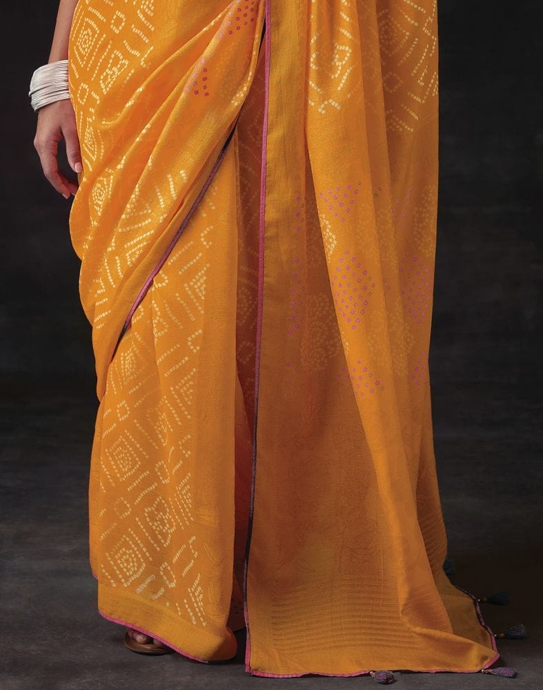 Collection of Yellow Bandhini Print Soft Brasso Saree in a gallery layout