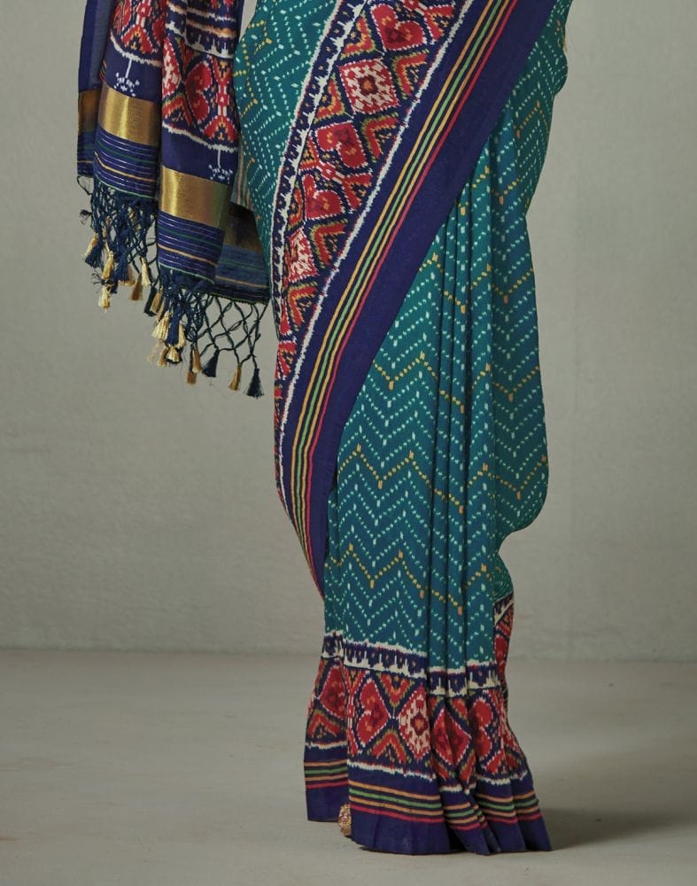 Collection of Teal Blue Ikat Print Patan Patola Saree in a gallery layout