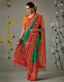 Collection of Green Ikat Print Patan Patola Saree in a gallery layout