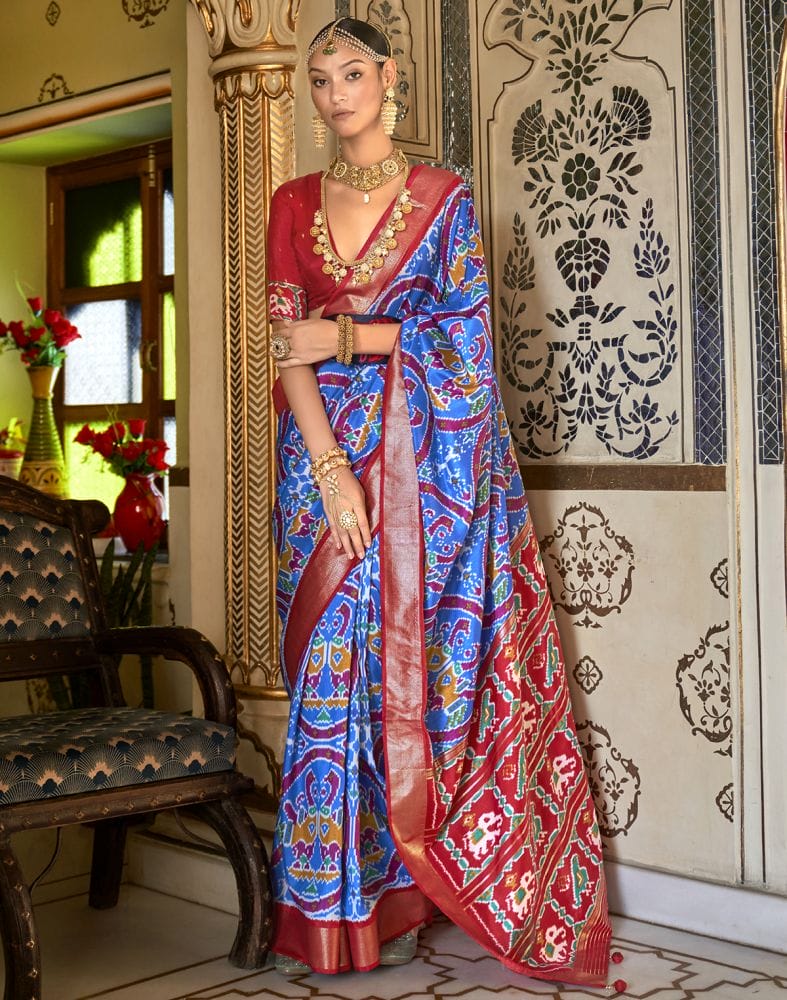 Collection of Fashionable Sky Blue Ikat Print Patola Saree in a gallery layout