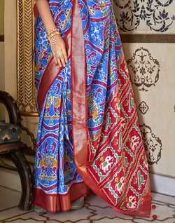 Collection of Fashionable Sky Blue Ikat Print Patola Saree in a gallery layout