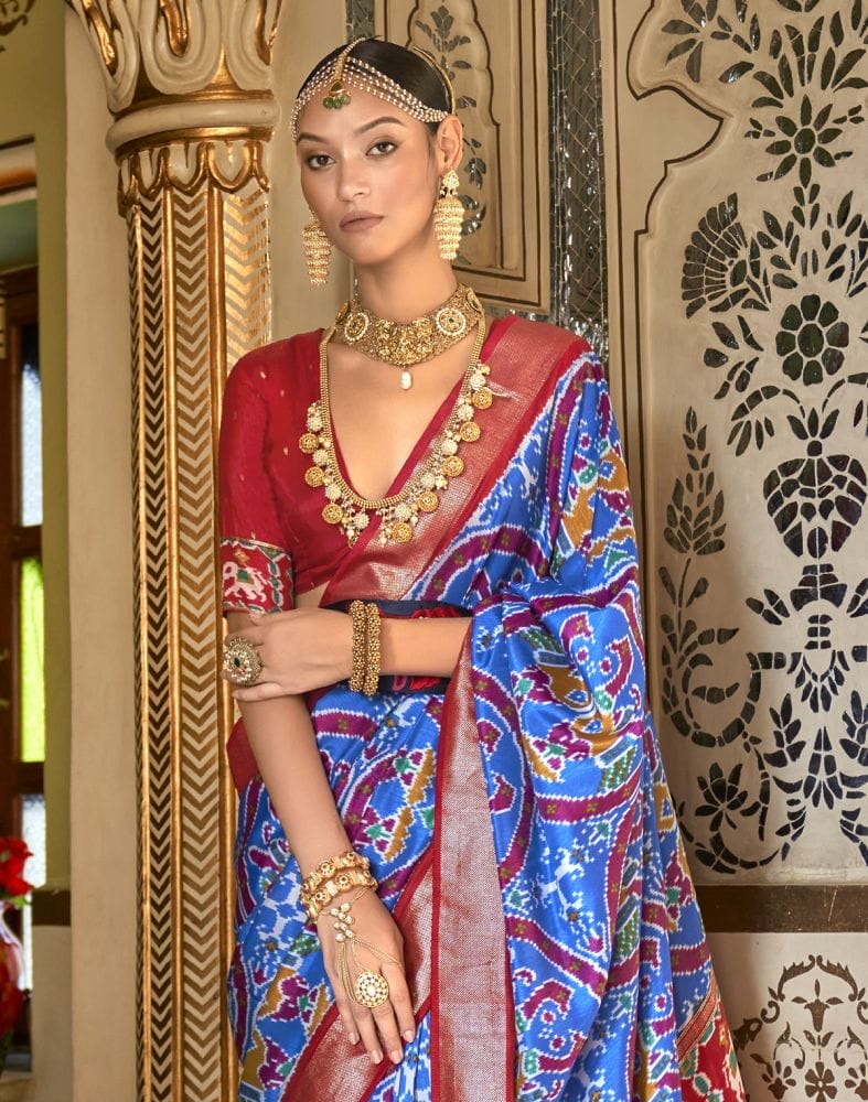 Collection of Fashionable Sky Blue Ikat Print Patola Saree in a gallery layout