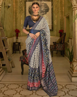 Collection of Cream Coloured Smooth Patola Silk Saree in a gallery layout