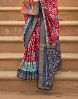 Collection of Cherry Red Ikat Patola Fabric Saree in a gallery layout