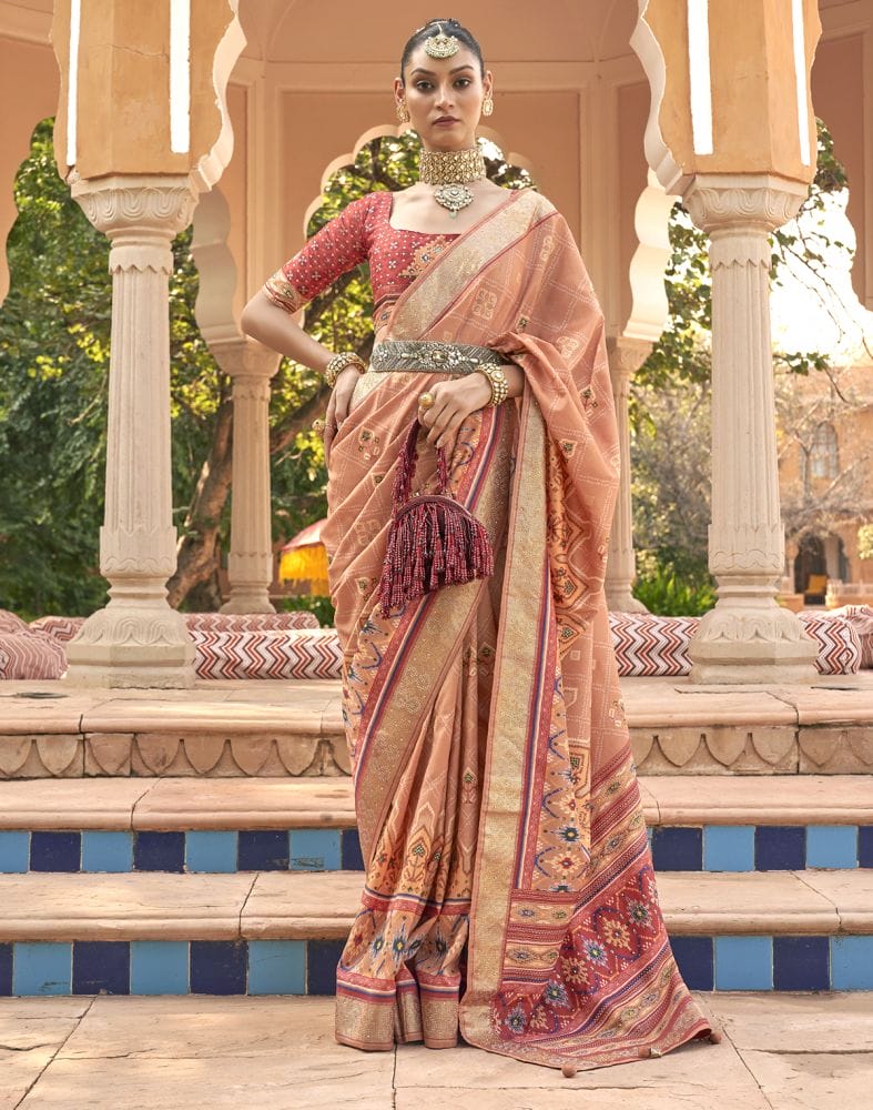 Collection of Exclusive Orange Geometric Print Patola Fabric Saree in a gallery layout