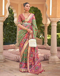 Collection of Beautiful Green Coloured Ikat Print Patola Saree in a gallery layout