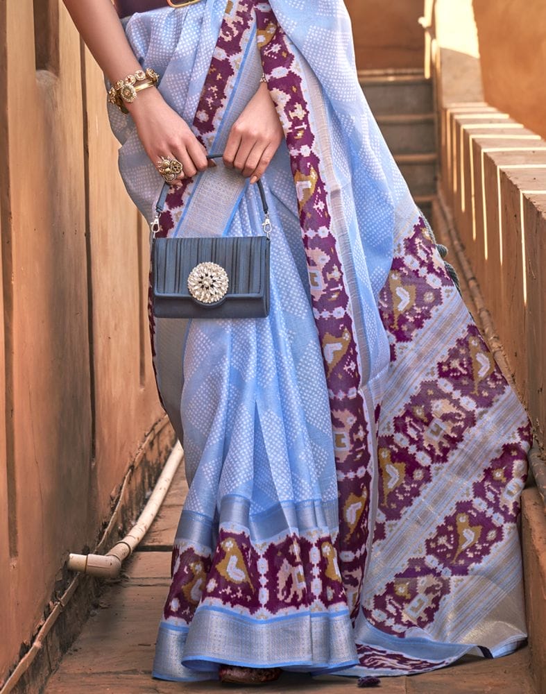 Collection of Light Blue Geometric Soft Cotton Silk Printed Saree in a gallery layout