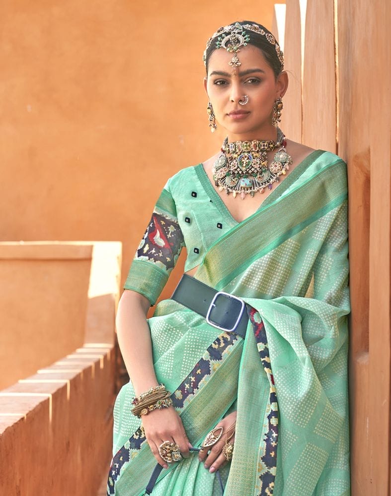 Collection of Exclusive Sea Green Geometric Print Cotton Silk Saree in a gallery layout