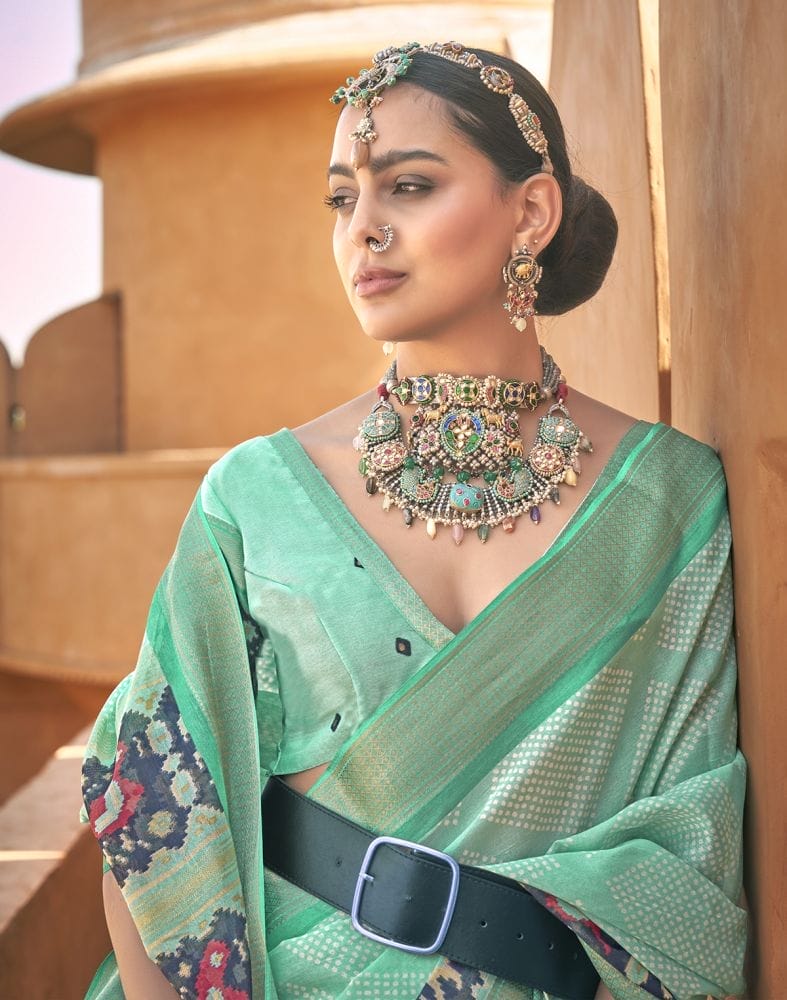 Collection of Exclusive Sea Green Geometric Print Cotton Silk Saree in a gallery layout