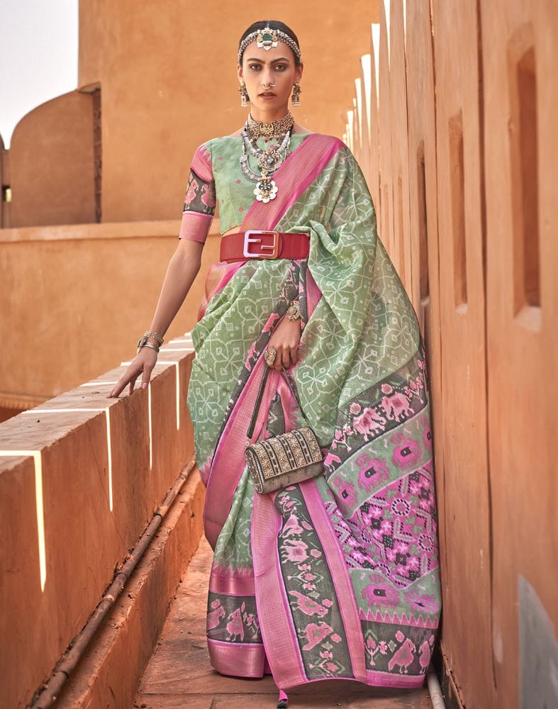 Collection of Light Green Colour Geometric Print Cotton Silk Fancy Saree in a gallery layout