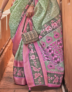 Collection of Light Green Colour Geometric Print Cotton Silk Fancy Saree in a gallery layout