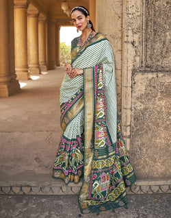 Collection of Green Stripes Soft Patola Fabric Saree in a gallery layout