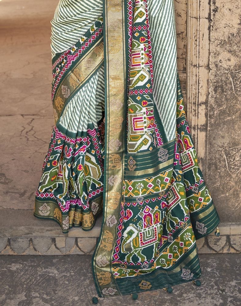 Collection of Green Stripes Soft Patola Fabric Saree in a gallery layout