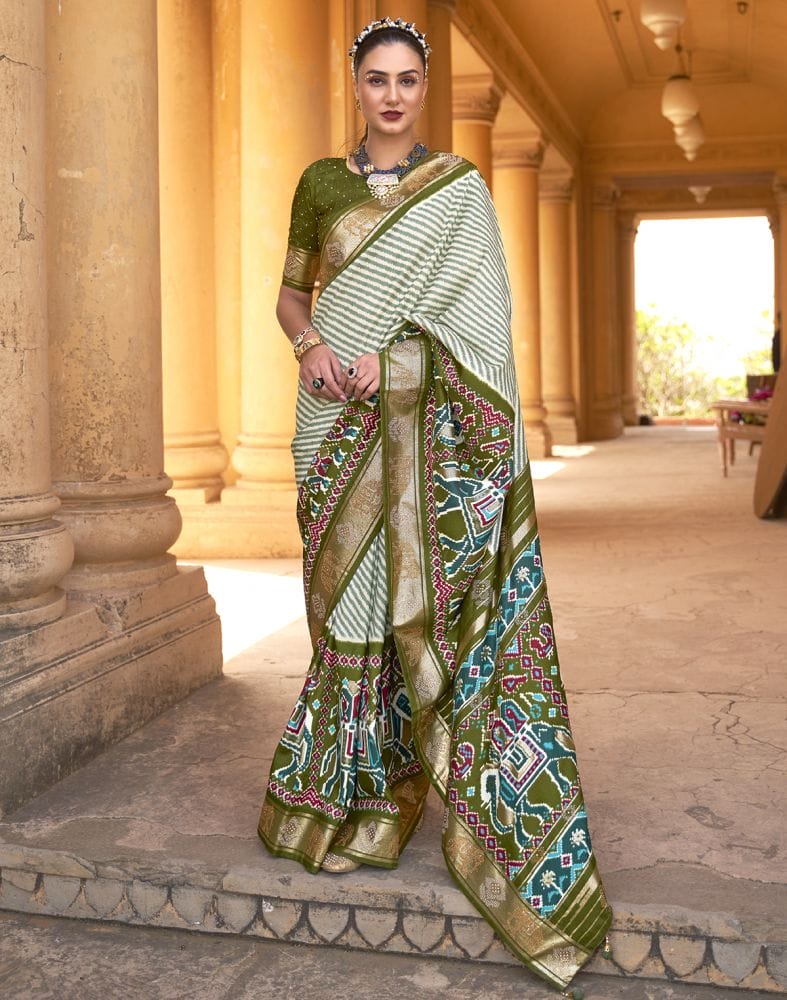 Collection of Light Green Striped Pattern Patola Silk Saree in a gallery layout