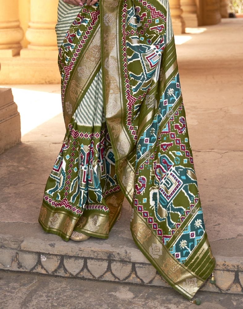 Collection of Light Green Striped Pattern Patola Silk Saree in a gallery layout