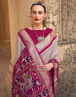 Collection of Brown Striped Patola Silk Saree in a gallery layout