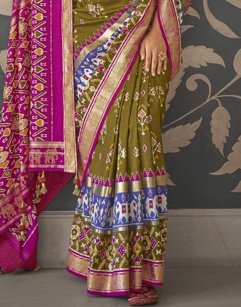 Collection of Light Mehendi Green Floral Print Patola Saree in a gallery layout