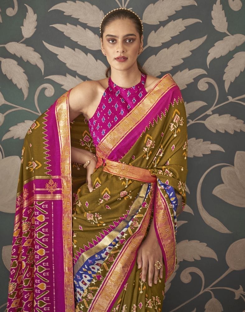 Collection of Light Mehendi Green Floral Print Patola Saree in a gallery layout