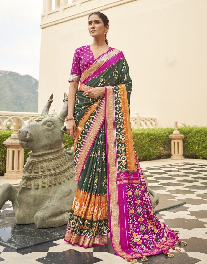 Gorgeous Dark Green Floral Patola Saree