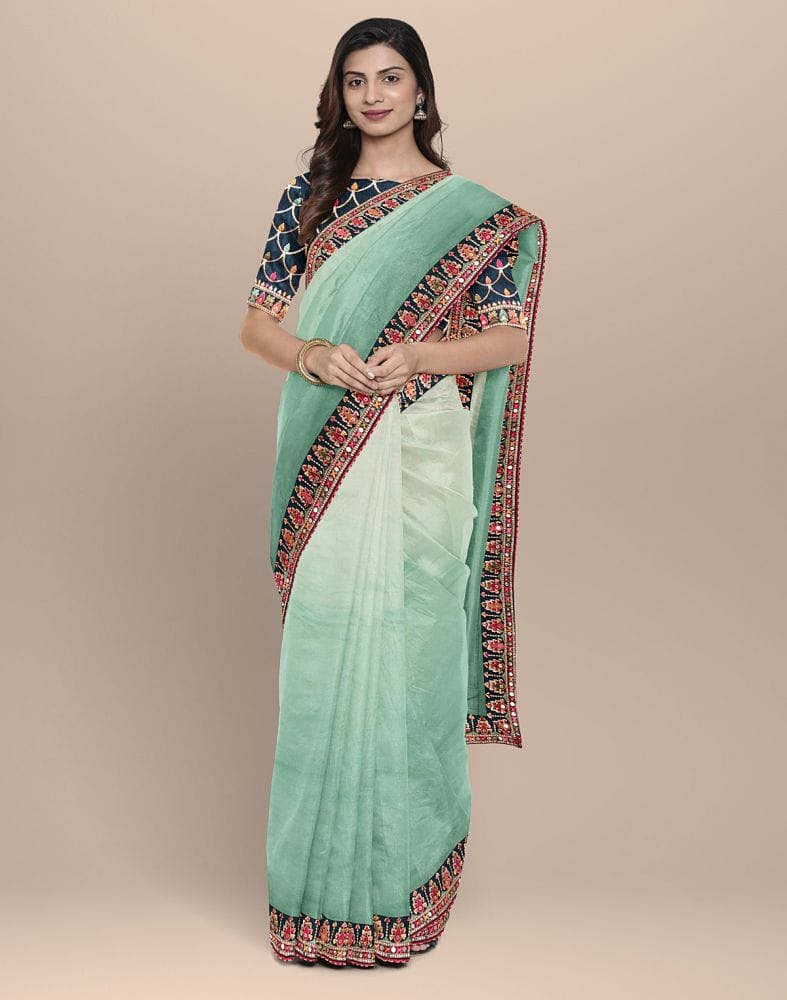 Collection of Rama Green Coloured Plain Organza Saree in a gallery layout