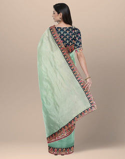 Collection of Rama Green Coloured Plain Organza Saree in a gallery layout