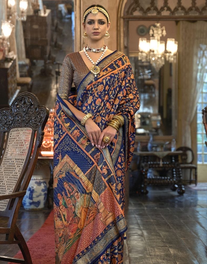 Collection of Royal Blue Floral Patola Mica Print Saree in a gallery layout