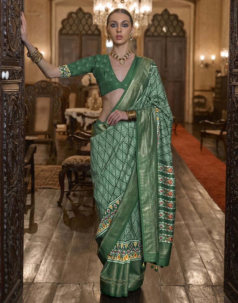 Collection of Bottle Green Geometric Print Param Patola Saree in a gallery layout