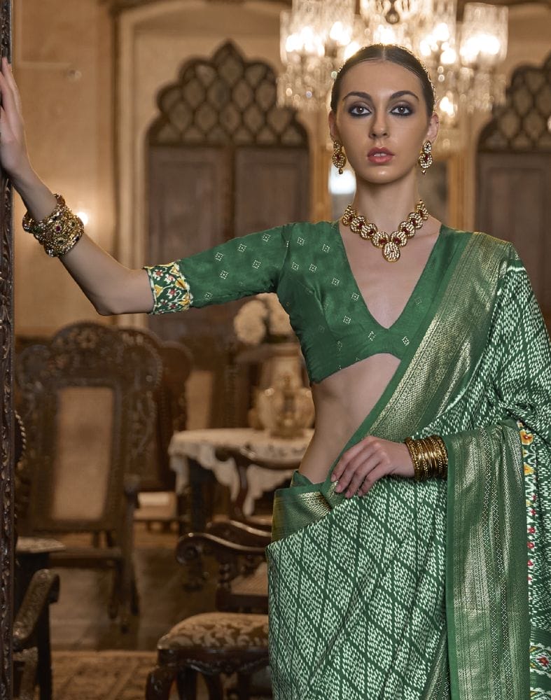 Collection of Bottle Green Geometric Print Param Patola Saree in a gallery layout